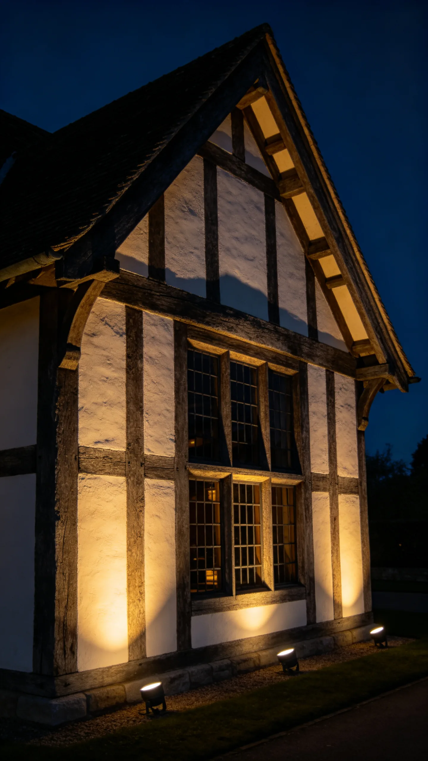 18. Emphasize Tudor Timber with Soft Uplighting